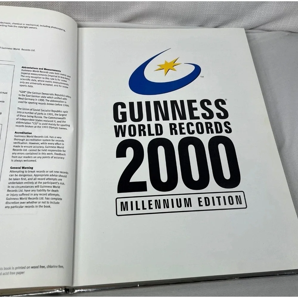Guinness World Records 2000 Millennium Edition Silver Foil Hardcover Y2K Book
